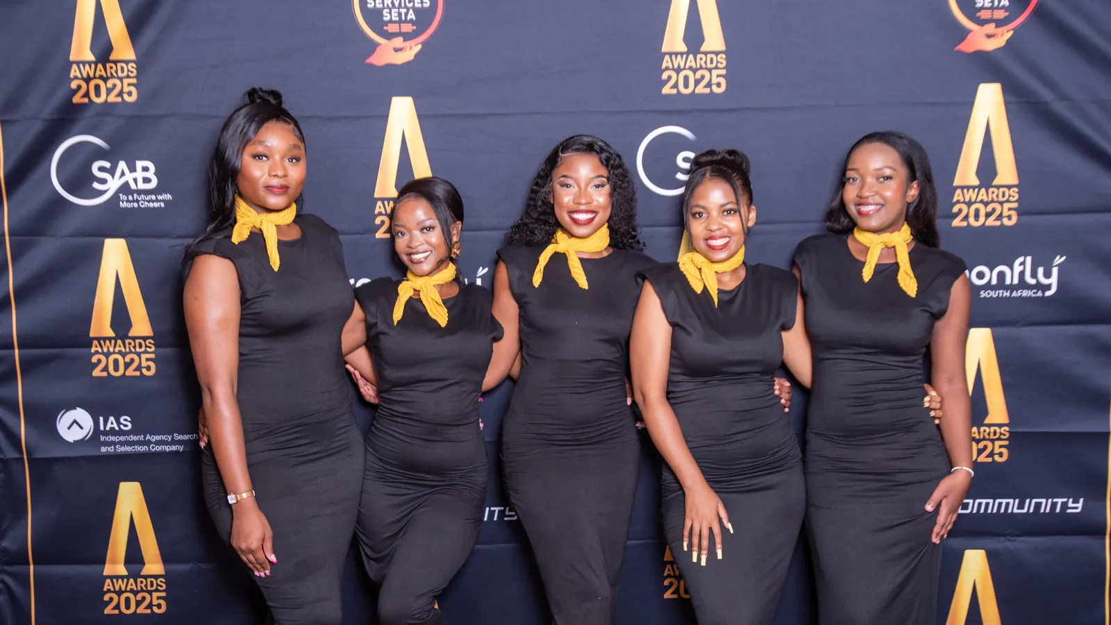 Event staff posing together at the Assegai Awards Evening 2025